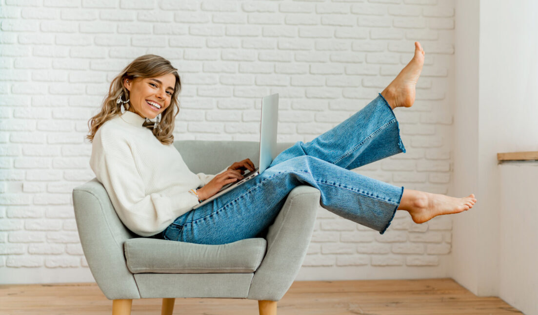 winter portrait of pretty woman in cozy sweater