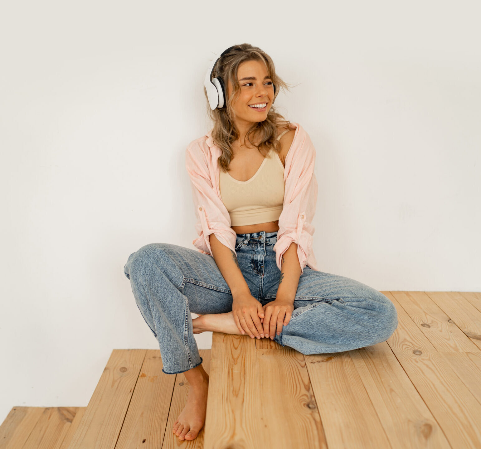 blond girl with pleasure listening favourite music